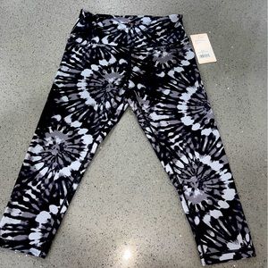 Danskin Women's All Over Printed Capri Legging, Black Salt Tie Dye Swirl, Medium